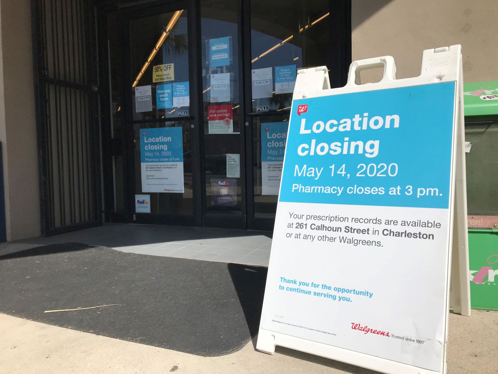 Walgreens closing sign at door on East Bay Street